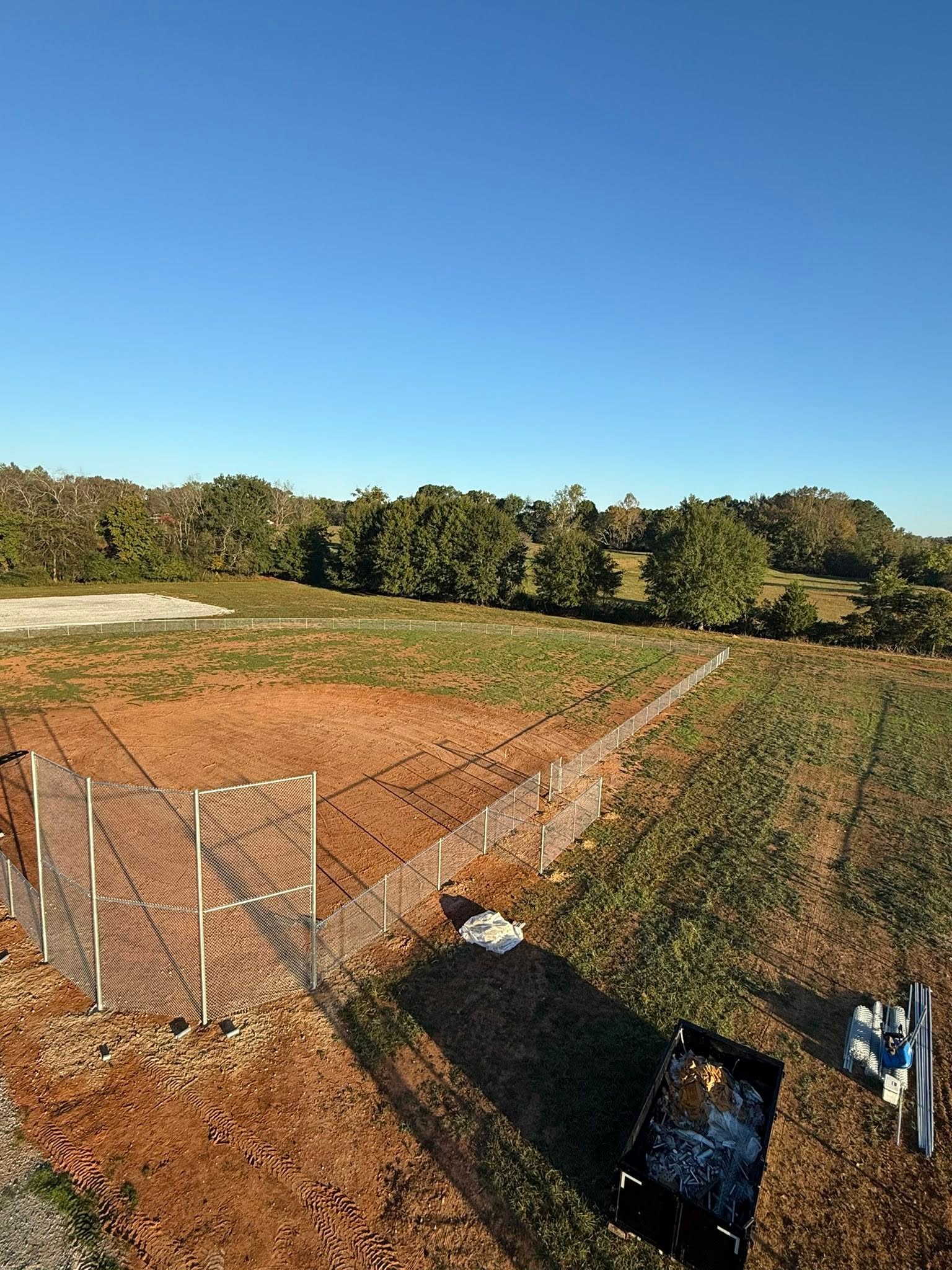 Commercial chain-link baseball field backstop fencing in Northern Alabama Commercial chain-link baseball field backstop fencing in Northern Alabama