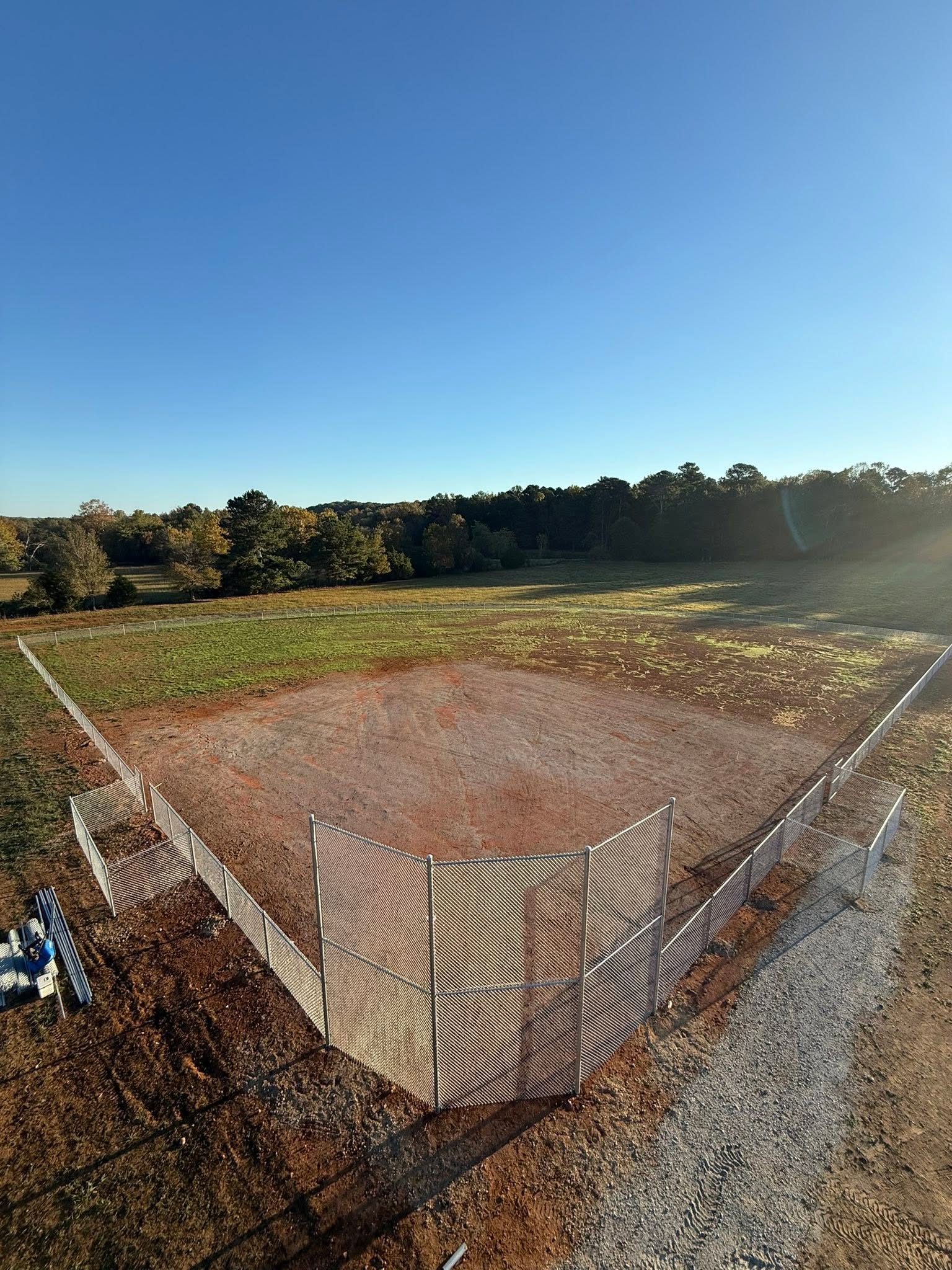 Sports field chain-link fence and backstop project in Northern Alabama Sports field chain-link fence and backstop project in Northern Alabama