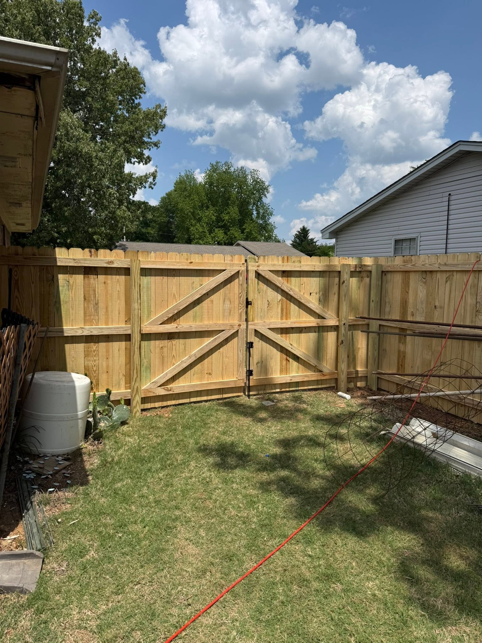 K-brace wood privacy double gate installation by Vaughn Fence in Northern Alabama K-brace wood privacy double gate installation by Vaughn Fence in Northern Alabama